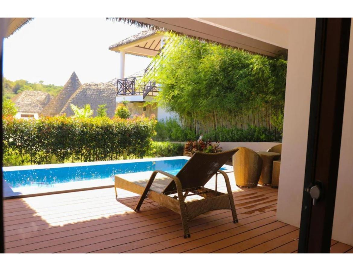 Safari Hotel And Villas Powered By Cocotel Bulala Exterior foto